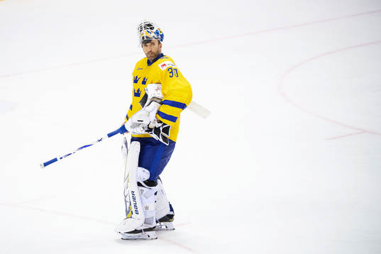goaltender Henrik Lundqvist of Sweden looks dejected