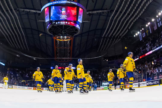 Players of Sweden look dejected