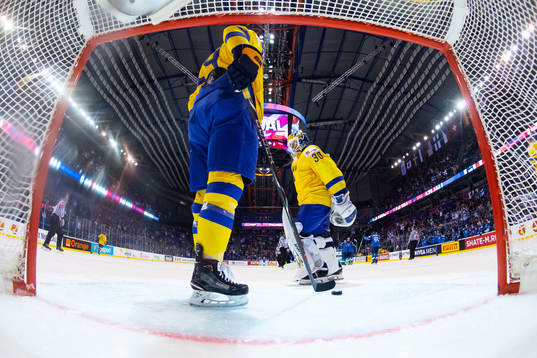 Goaltender Henrik Lundqvist of Sweden looks dejected
