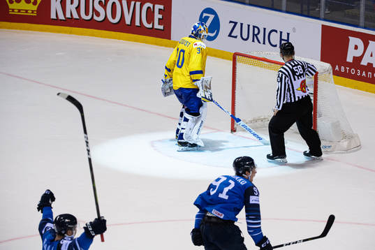 Goaltender Henrik Lundqvist of Sweden looks dejected while