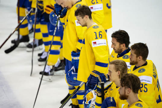 Goaltender Henrik Lundqvist of Sweden looks dejected