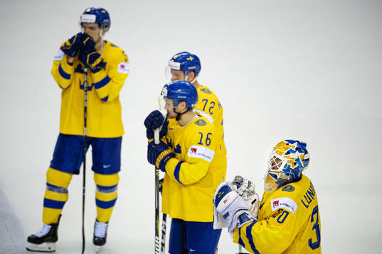Goaltender Henrik Lundqvist of Sweden looks dejected