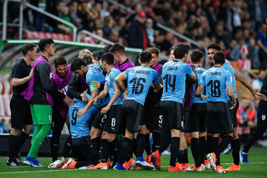 Darwin Nunez of Uruguay celebrates with teammates