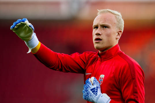 Goalkeeper Julian Faye Lund of Norway warms up