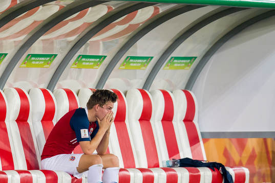Jens Hauge of Norway looks dejected