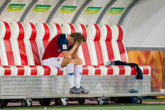Jens Hauge of Norway looks dejected