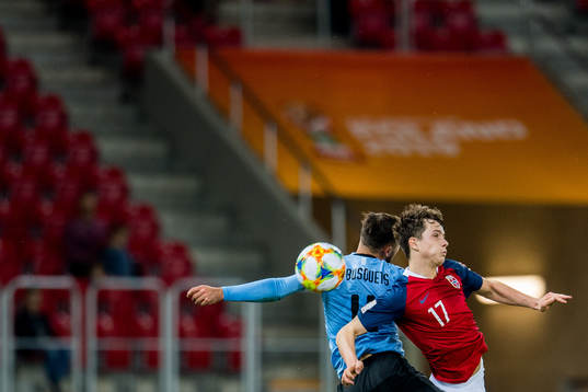 Ezequiel Busquets Sanguinetti of Uruguay and Håkon Evjen