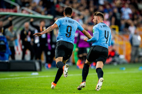 Darwin Nunez of Uruguay celebrates with teammate Ezequiel