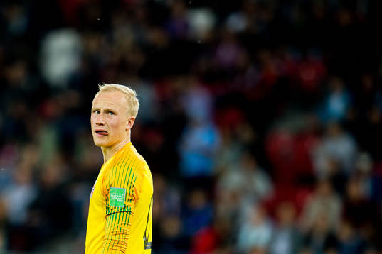 Goalkeeper Julian Faye Lund of Norway looks dejected