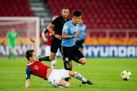 Håkon Evjen of Norway and Brian Rodriguez of Uruguay