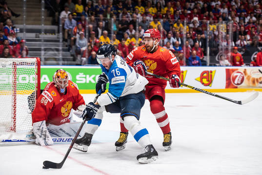 Jere Sallinen of Finland against goaltender Andrei