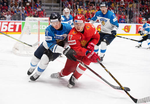 Henri Jokiharju of Finland and Nikita Gusev of Russia