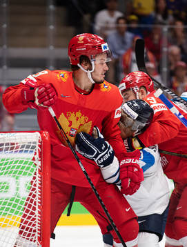 Mikhail Sergachyov and Nikita Nesterov of Russia hold
