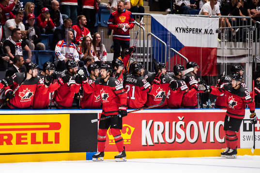 Mark Stone and Troy Stecher of Canada celebrate
