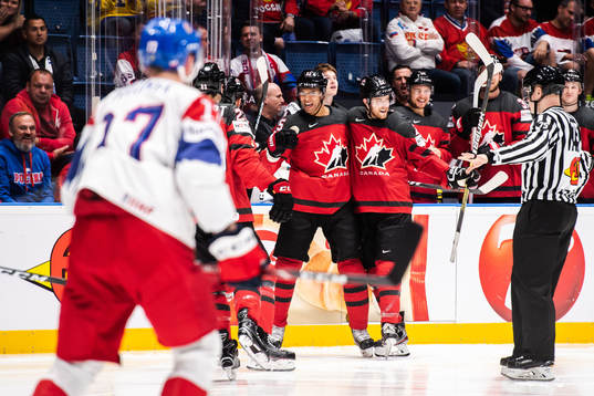 Sam Reinhart, Darnell Nurse and Damon Severson of Canada