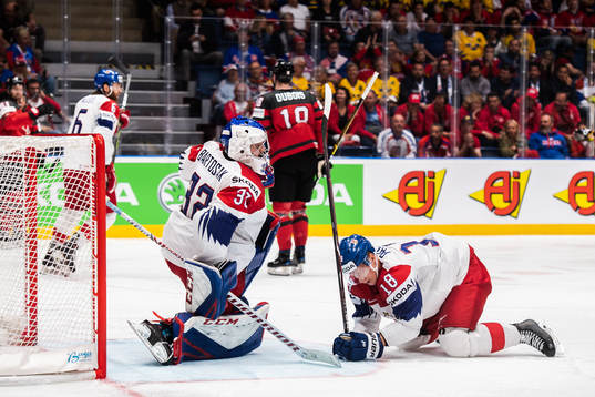 Goaltender Patrik Bartosak and Ondrej Palat of Czech