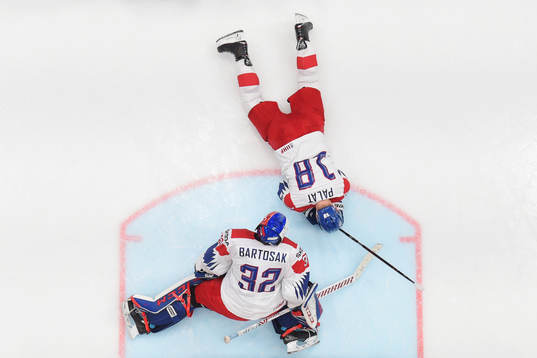Goaltender Patrik Bartosak and Ondrej Palat of Czech