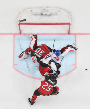 Goaltender Matt Murray and Darnell Nurse of Canada in