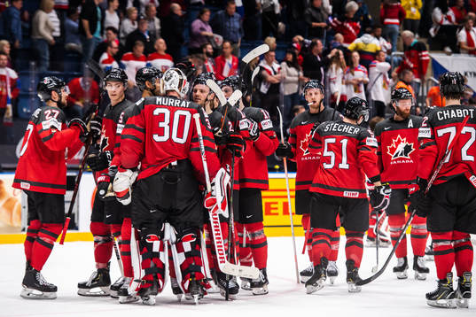 Goaltender Matt Murray of Canada celebrate with teammates
