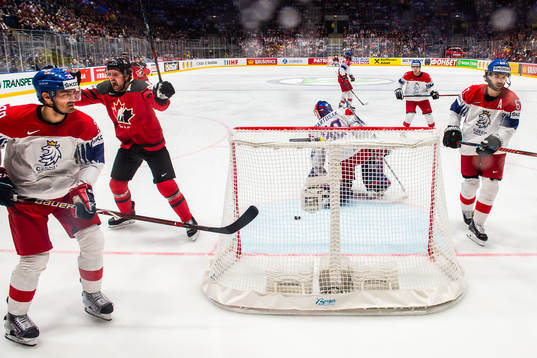 Jan Kolar, goaltender Patrik Bartosak and Michael Frolik of