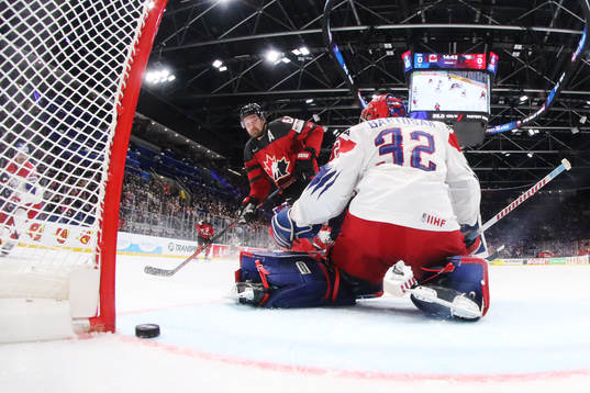 Mark Stone of Canada scores the 1-0 goal behind goaltender