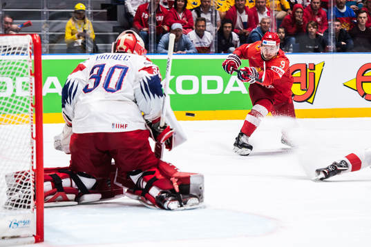 Dmitry Orlov of Russia and goaltender Simon Hrubec of Czech