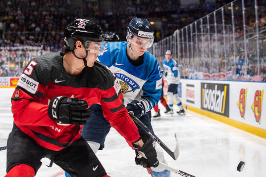 Philippe Myers of Canada and Kaapo Kakko of Finland