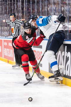 Dante Fabbro of Canada and Marko Anttila of Finland