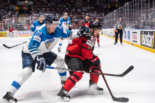 Niko Mikkola of Finland and Jonathan Marchessault of Canada