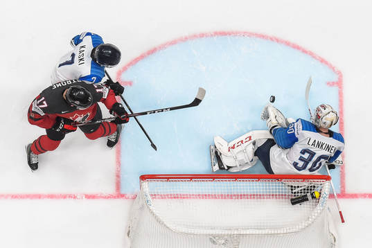 Dylan Strome of Canada against Oliwer Kaski and goaltender