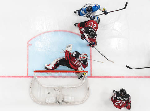 Marko Anttila of Finland (not in picture) scores 1-2 behind