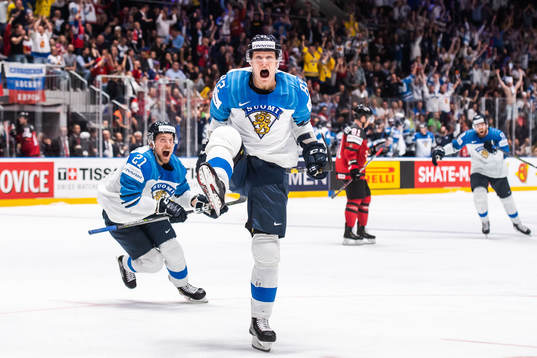 Juhani Tyrväinen and Harri Pesonen of Finland celebrate