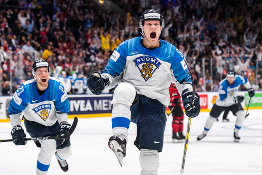Juhani Tyrväinen and Harri Pesonen of Finland celebrate