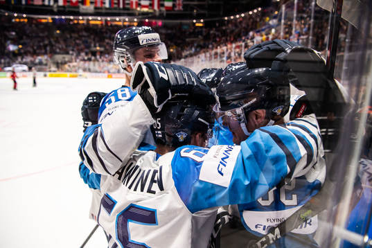 Harri Pesonen of Finland celebrate with Jani Hakanpää and