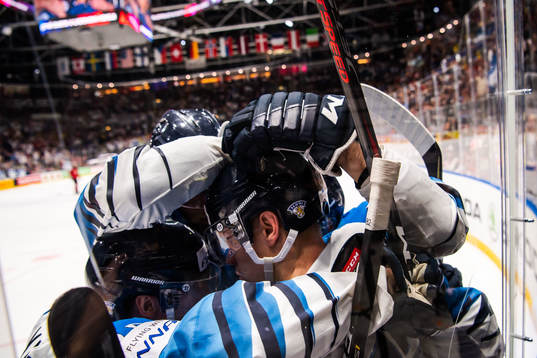 Harri Pesonen of Finland celebrate with Jani Hakanpää and