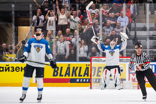 Goaltender Kevin Lankinen of Finland celebrate their win