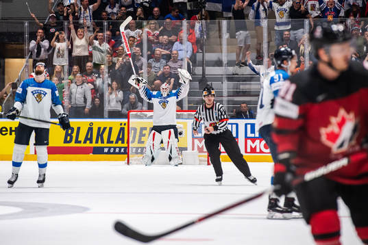 Goaltender Kevin Lankinen of Finland celebrate their win