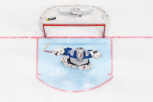 Goaltender Kevin Lankinen of Finland celebrate their win