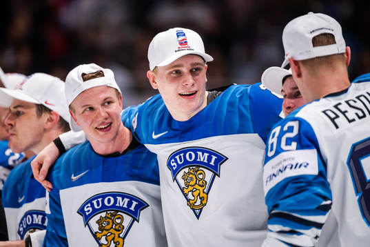 Kaapo Kakko of Finland celebrate their win