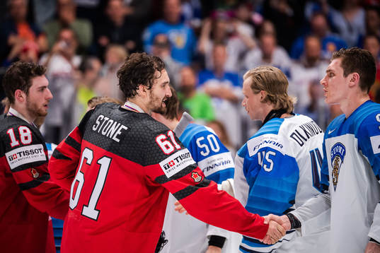 Pierre-Luc Dubois and Mark Stone of Canada
