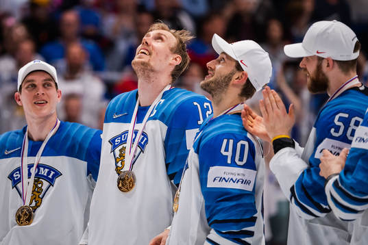 Marko Anttila of Finland celebrate with his gold medal