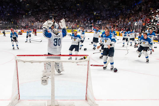 Goaltender Kevin Lankinen of Finland celebrate their win