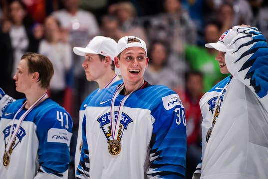 Goaltender Kevin Lankinen of Finland celebrate with his