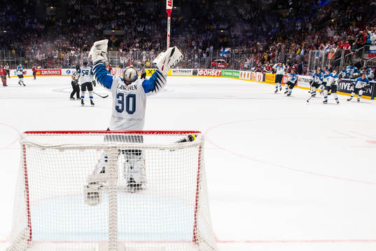 Goaltender Kevin Lankinen of Finland celebrate their win