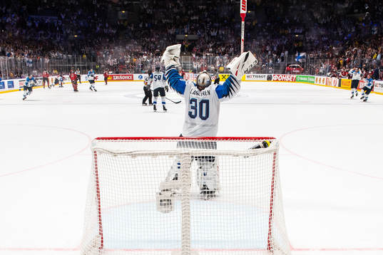 Goaltender Kevin Lankinen of Finland celebrate their win
