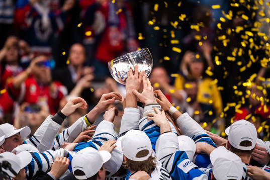 Players of Finland celebrates with the trophy