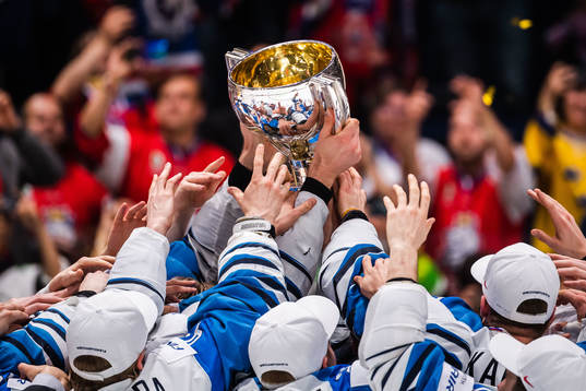 Players of Finland celebrates with the trophy