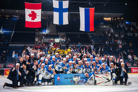 Players of Finland celebrates with the trophy