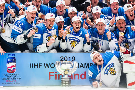 Players of Finland celebrates with the trophy