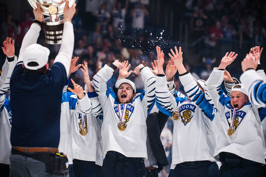 Players of Finland celebrates with the trophy